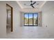 Spacious bedroom with marble floors and sliding glass doors at 29646 N 109Th Pl # 128, Scottsdale, AZ 85262