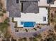 Aerial view of home showing pool and patio area at 29646 N 109Th Pl # 128, Scottsdale, AZ 85262