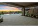 Covered patio with built-in grill and sunset views at 29646 N 109Th Pl # 128, Scottsdale, AZ 85262