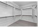 Large walk-in closet with ample shelving and hanging space at 22782 E Stacey Rd, Queen Creek, AZ 85142