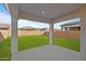 Covered patio overlooking a lush green backyard at 22782 E Stacey Rd, Queen Creek, AZ 85142