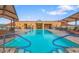 Inviting rooftop pool with ample lounge chairs and a spa at 7175 E Camelback Rd # 704, Scottsdale, AZ 85251