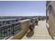 Long balcony with city views and potted plants at 7175 E Camelback Rd # 704, Scottsdale, AZ 85251