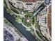 Bird's eye view of canal-front property with lush landscaping at 7175 E Camelback Rd # 704, Scottsdale, AZ 85251