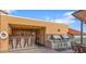 Rooftop outdoor kitchen with grills and bar seating at 7175 E Camelback Rd # 704, Scottsdale, AZ 85251