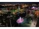 Night view of a canal with lights and festive decorations at 7175 E Camelback Rd # 704, Scottsdale, AZ 85251