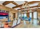 Elegant clubhouse with wood-beamed ceilings and comfortable seating at 7175 E Camelback Rd # 704, Scottsdale, AZ 85251
