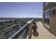 Relaxing patio overlooking a canal with city views in the background at 7175 E Camelback Rd # 704, Scottsdale, AZ 85251
