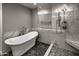 Elegant bathroom with marble accents and a freestanding tub at 7175 E Camelback Rd # 704, Scottsdale, AZ 85251
