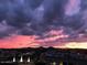 Stunning sunset over city skyline with mountain views at 7175 E Camelback Rd # 704, Scottsdale, AZ 85251
