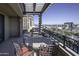 Outdoor patio with table and chairs, offering city views at 7175 E Camelback Rd # 704, Scottsdale, AZ 85251