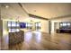 Spacious living area with hardwood floors, and city views at 7175 E Camelback Rd # 704, Scottsdale, AZ 85251