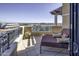 Private balcony with seating and city views at 7175 E Camelback Rd # 704, Scottsdale, AZ 85251