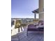 Private balcony with city views and comfortable seating at 7175 E Camelback Rd # 704, Scottsdale, AZ 85251
