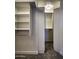 Large walk-in closet with shelves and hanging rods at 7175 E Camelback Rd # 704, Scottsdale, AZ 85251