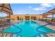 Inviting rooftop pool with ample lounge chairs and a spa at 7175 E Camelback Rd # 704, Scottsdale, AZ 85251