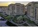 Luxury highrise building with water views at sunset at 7175 E Camelback Rd # 704, Scottsdale, AZ 85251