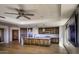 Gourmet kitchen with island, granite counters, and hardwood floors at 7175 E Camelback Rd # 704, Scottsdale, AZ 85251