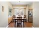 Cozy dining area with wood flooring and built-in shelving at 14950 W Mountain View Blvd # 5101, Surprise, AZ 85374