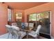 Glass-top patio table with seating for six at 14950 W Mountain View Blvd # 5101, Surprise, AZ 85374