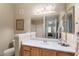 Bathroom with single sink vanity and large mirror at 14950 W Mountain View Blvd # 5101, Surprise, AZ 85374