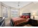 Spacious bedroom with a king-size bed and plenty of natural light at 14950 W Mountain View Blvd # 5101, Surprise, AZ 85374