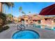 Relaxing hot tub nestled near the pool and community building at 14950 W Mountain View Blvd # 5101, Surprise, AZ 85374