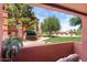 View from patio shows grassy courtyard at 14950 W Mountain View Blvd # 5101, Surprise, AZ 85374