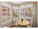 Bright breakfast nook with a table and chairs, overlooking the courtyard at 14950 W Mountain View Blvd # 5101, Surprise, AZ 85374