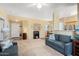 Living room with open layout and views of entryway at 14950 W Mountain View Blvd # 5101, Surprise, AZ 85374