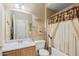 Clean bathroom with shower/tub combo at 14950 W Mountain View Blvd # 5101, Surprise, AZ 85374