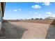 Sunny backyard with block wall for privacy at 37520 W Padilla St, Maricopa, AZ 85138