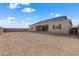 Spacious backyard providing a blank canvas for landscaping at 37520 W Padilla St, Maricopa, AZ 85138