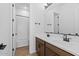 Modern bathroom with double vanity and shower/tub combo at 37520 W Padilla St, Maricopa, AZ 85138
