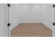 Simple bedroom with wood-look floors and neutral walls at 37520 W Padilla St, Maricopa, AZ 85138