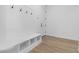 Clean entryway with built-in bench and storage at 37520 W Padilla St, Maricopa, AZ 85138