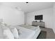 Main bedroom with a king-size bed and stylish decor at 37520 W Padilla St, Maricopa, AZ 85138
