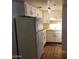 Simple kitchen with white cabinets and flooring at 12221 W Bell Rd # 335, Surprise, AZ 85378