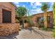 Landscaped courtyard with native plants and brick pavers at 28080 N 101St St # 116, Scottsdale, AZ 85262