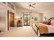 King bedroom with private access to backyard, ceiling fan and lots of natural light at 28080 N 101St St # 116, Scottsdale, AZ 85262