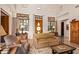 Spacious living room with high ceilings and neutral decor at 28080 N 101St St # 116, Scottsdale, AZ 85262