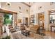 Bright living room with hardwood floors and large windows at 28080 N 101St St # 116, Scottsdale, AZ 85262