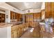 Spacious kitchen with wood cabinets and tile countertops at 28080 N 101St St # 116, Scottsdale, AZ 85262