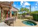 Private backyard with a spa and pergola at 28080 N 101St St # 116, Scottsdale, AZ 85262