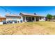 Backyard view of home with covered patio at 25413 W Pueblo Ave, Buckeye, AZ 85326