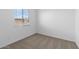 Bright bedroom with carpet and window coverings at 37645 W Padilla St, Maricopa, AZ 85138