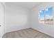 Simple bedroom with carpeted floors and a window at 37645 W Padilla St, Maricopa, AZ 85138