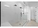 Spacious walk-in shower with dual shower heads and bench at 37645 W Padilla St, Maricopa, AZ 85138