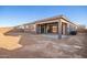 House exterior view showcasing backyard and patio at 20230 W Hollyhock St, Buckeye, AZ 85396