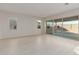 Spacious living room with sliding glass doors leading to the backyard at 20230 W Hollyhock St, Buckeye, AZ 85396